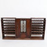 An Antique mahogany J C Cox Royal Letters patent shop counter-top postage stamp dispenser, W65cm,