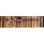 A group of 19th and 20th century leather-bound books, including Discoveries and Inventions, and