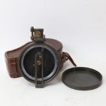 A Stanley of London prismatic surveying compass, with folding sights and 2 colour filters, in