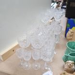 A group of crystal drinking glasses, including wine and Sherry