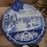 A large Dutch Delft blue and white ceramic wall plaque, ice skating scene, 58cm x 48cm