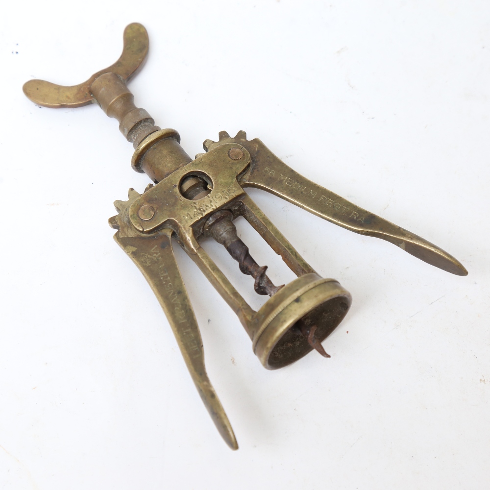 A Second World War Period brass lever corkscrew, with military inscription "Lieutenant R P Anstey