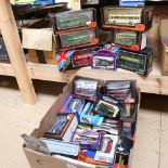A large quantity of various Vintage toy transport vehicles, buses and cars, including Exclusive