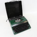A Silver Reed Silverette II green Retro portable typewriter