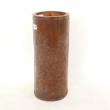 A Chinese carved bamboo brush pot, floral and character mark decoration, height 23cm