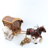 A gypsy caravan and porcelain Shire horse, and a polished hardstone rhino, length 40cm