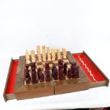 An Oriental folding games box, with chess board and chessmen