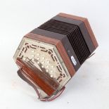 A Vintage Hohner aluminium-bound concertina