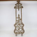 A large gilded cast-iron gate bracket/stand, overall length 90cm