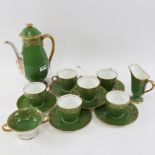 A Royal Doulton gilded green ground coffee service