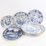 A group of 18th and 19th century blue and white plates and tea bowls