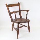 An Antique elm-seated doll's chair, seat height 28cm