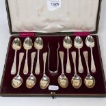An Edwardian cased set of 12 matching silver teaspoons and a pair of sugar tongs, by W S Savage &