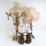 A group of various table lamps, including large figural example with glass funnel and shade,