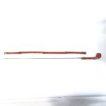 A lacquered bamboo sword stick walking cane with lion head knop, Blade length 75cm