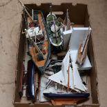 A group of table-top model sailing ships, largest length 40cm