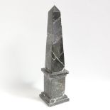 A large green veined marble obelisk statue, height 47cm