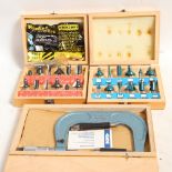 2 cased 12-piece router bit sets, and a micrometer (3)