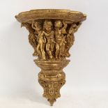 A large gilt composition Classical design wall bracket, height 41cm