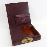 An Antique leather-covered travelling document case, with Bramah lock, width 31cm