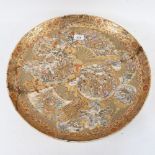 A large Japanese Satsuma style charger, painted and gilded figural decoration, diameter 45cm,