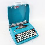 A Smith Corona Calypso blue Retro portable typewriter