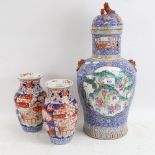A large Chinese famille rose blue ground baluster jar and cover, and a pair of Japanese Imari