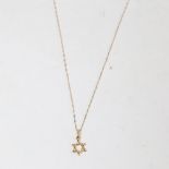 A modern 9ct gold Star of David pendant necklace, chain length 42cm