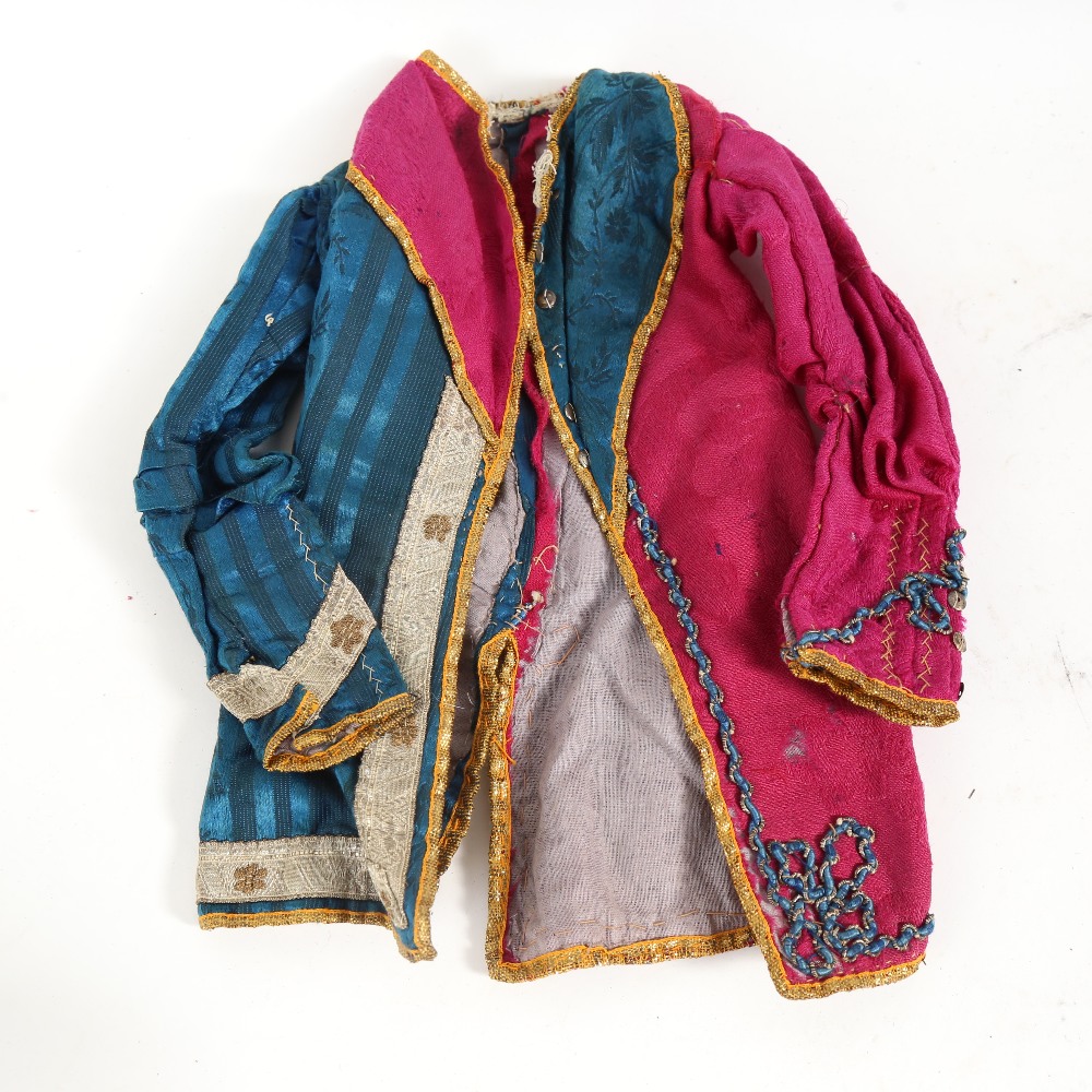 An Antique hand stitched and embroidered miniature jacket, possibly for a performing monkey,