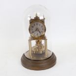 A German Gustav Becker brass 400-day clock under glass dome, overall height 29cm