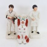 A pair of Staffordshire pottery figures of boys, 6am and 6pm, largest height 32cm (2)