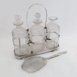 A silver plated 3-bottle decanter stand with bottles, and a Art Deco style silver-backed dressing
