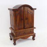 A mahogany table-top dome-top collector's cabinet of drawers, W29cm, H44cm, D15cm