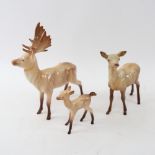 A Beswick porcelain deer family, largest height 20cm (3)