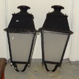 A pair of black painted metal lanterns with perspex panels, H75cm