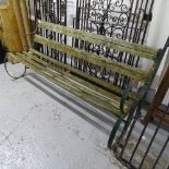 A Victorian scrolled wrought-iron garden bench, L177cm