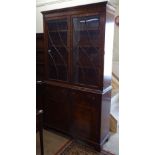 A reproduction mahogany 2-section bookcase, W115cm, H206cm, D40cm