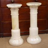 A pair of sectional turned alabaster jardiniere stands, W23cm, H65cm