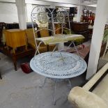 A blue painted circular aluminium garden table, and a pair of matching folding garden chairs