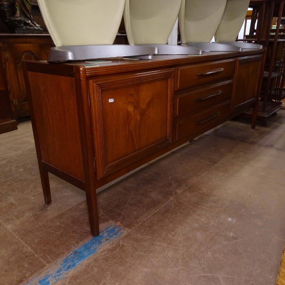 A mid-century teak dining room suite, comprising a bow-end drop leaf dining table, 4 matching chairs - Image 2 of 2