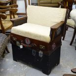 An unusual upholstered seat made from a Vintage leather suitcase