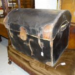 A Victorian dome-top leather-bound travelling trunk, with fitted tray