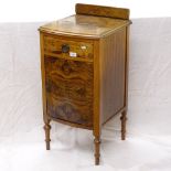 A 1930s walnut bow-front bedside cupboard, W40cm, H80cm, D37cm