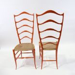 CHIAVARI, Italy, A pair of exaggerated high ladder back chairs, in sculpted wood in the manner of