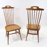 A pair of 1950s' Danish chairs, with blade form spindles, sculpted top rail and solid seat, height