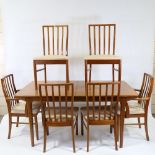 MACKINTOSH, extending teak dining table with two extra leaves and set of 6 chairs (2 Carvers),