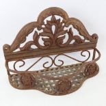 A cast-iron backed wall hanging plant rack, width 38.5cm, height 27cm Rusty all over but no damage