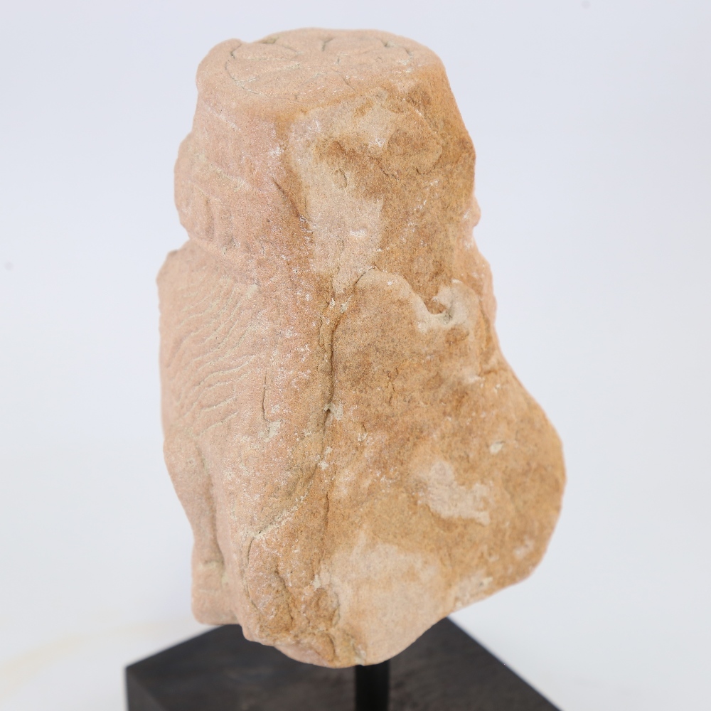 An Indian carved red stone head of a goddess, modern block plinth, overall height 23cm Probably a - Image 3 of 4