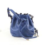 PROENZA - a small dark blue leather handbag with shoulder strap and dust bag, height 15cm Very