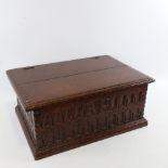 An 18th century oak Bible box, with Arcadian carved front panel and initials AP, 45cm x 30cm x